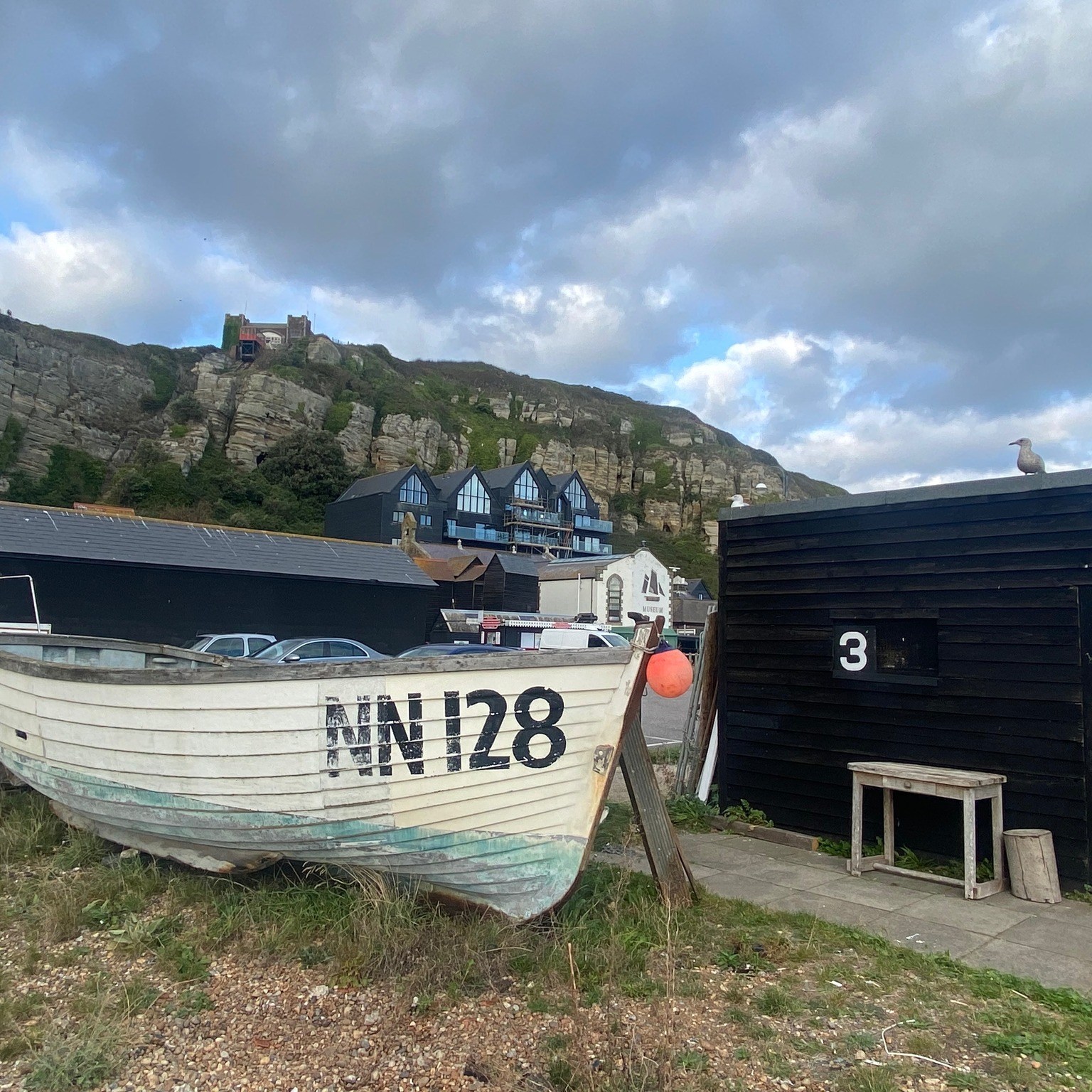 Outdoor old boat scene near Hastings Cliffs